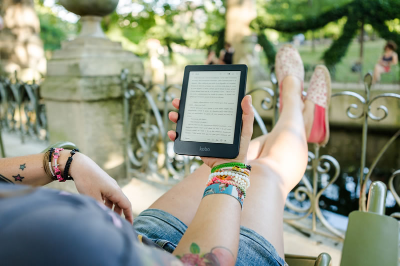 Woman Reading on Mobile Device